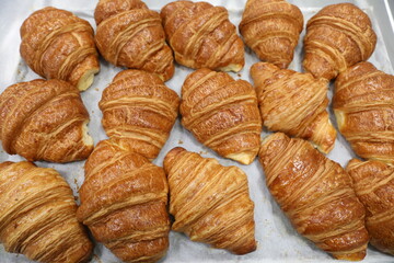 Baking croissants in a small bakery