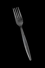 Fork stainless steel isolated on black background