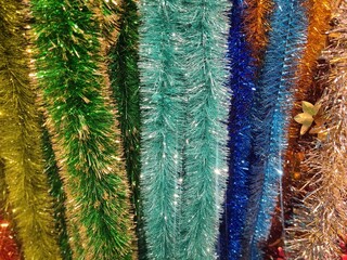 Colorful tinsel background for Merry Christmas and New Year party