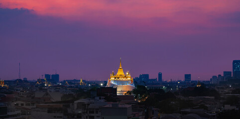 Golden Mountain or Wat Saket Ratcha Wora Maha Wihan panorama view after sunset, in Bangkok one of the tourist attraction and Landmarks of Thailand