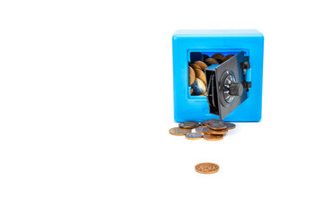 blue piggy bank in the form of a safe with coins on a white background, money concept