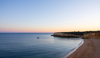 Fototapeta na wymiar Beautiful sunset on the New Beach (Praia Nova) in Porches, Algarve, Portugal