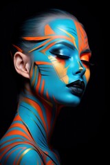 Fototapeta na wymiar a woman with bright blue and orange body paint on her face and chest, with her face painted orange and blue.
