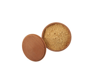 Ground mustard powder in wooden bowl on white background, top view