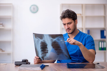 Young male doctor radiologist working in the clinic