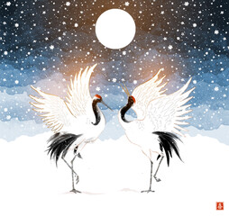 Obraz premium Two dancing japanese red-crowned crane birds on blue forest background in the snow. Traditional Japanese ink wash painting sumi-e. Translation of hieroglyph - joy