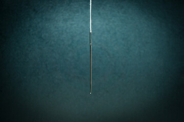 Sewing Needle Close-up. Move the Needle Concept.