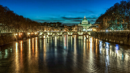 Panorama Bridge of Angels and St. Peter's Basilica in Rome at blue hour