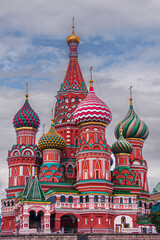 Fototapeta na wymiar The towers of Saint Basil's Cathedral isolated against cloudscape, Moscow, Russia