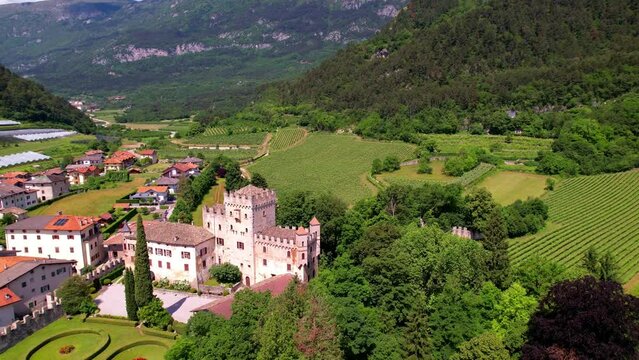 Most scenic medieval castles of Italy - Castel Terlago with beautiful gardens in Trentino region, Trento province. Aerial drone panoramic view