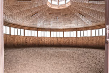 Fotobehang round pen for training horses. How it looks inside © Iuliia