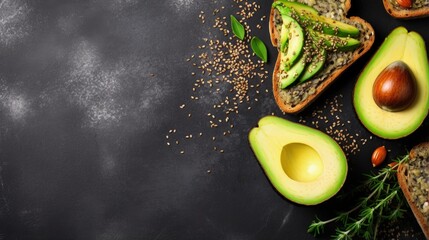 Healthy avocado toasts for breakfast or lunch with rye bread, sliced avocado, pumpkin seeds, salt and pepper. Vegetarian food. Plant-based diet. Clean eating. Top view. Copy space, - obrazy, fototapety, plakaty