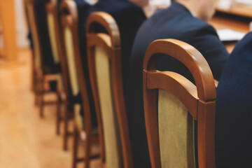 Group of men in business suits talking and discussing at conference, politicians and entrepreneurs...
