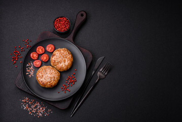 Delicious fresh fried minced fish cutlets with spices and herbs