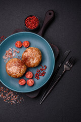Delicious fresh fried minced fish cutlets with spices and herbs