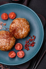 Delicious fresh fried minced fish cutlets with spices and herbs