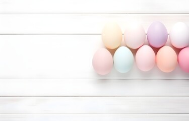 Easter holiday colorful eggs on white wooden table for greeting card decor