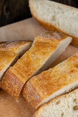 wheat loaf of bread close-up on the table