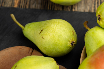 fresh harvest of pears on the table in the kitchen