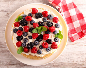 Cream and mixed berry sandwich cake