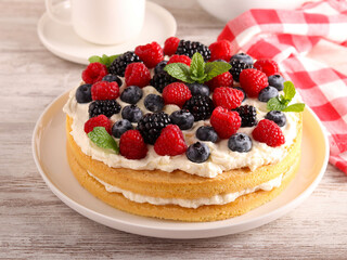 Cream and mixed berry sandwich cake
