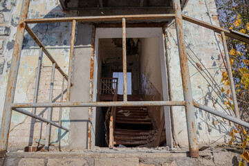 Izyum, Ukraine - November 10, 2023, destroyed entrance to the house, broken stairs