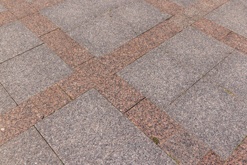 part of the pedestrian road is made of tiles