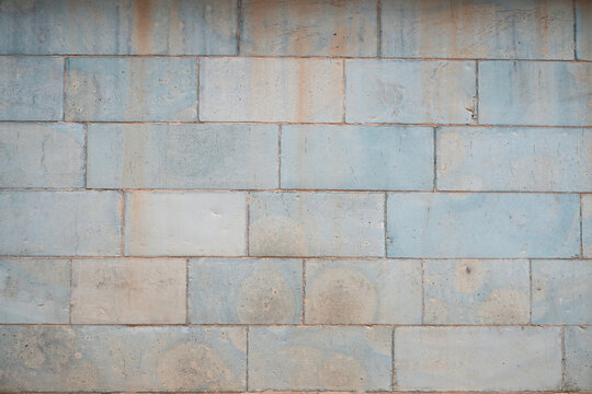 Brick pattern with blue and white gradient.