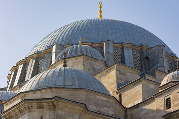 Fototapeta na wymiar Domes of Suleymaniye Mosque. Ottoman architecture background photo