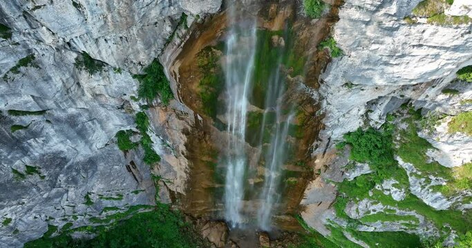 Beautiful waterfall in green forest, top view