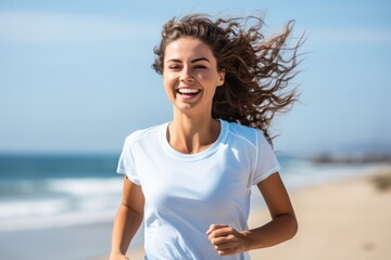 Close up portrait of smiling athlete woman runner outdoors, wearing sporty clothes and jogging