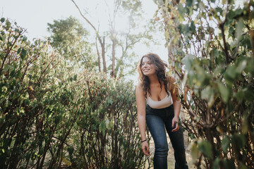 Friends enjoy a carefree autumn day in a green park, having fun conversations and socializing. They exude positive energy and well-being, surrounded by nature.