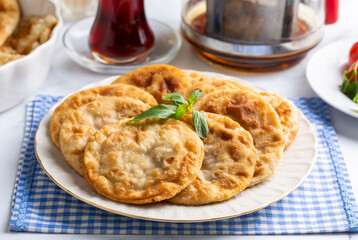 Delicious meat pie from Turkish cuisine. Fried handmade pies. Turkish name; fincan boregi