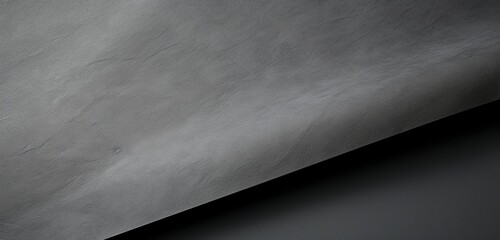 a blank slate gray paper poster texture, highlighting its neutrality and adaptability.