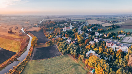 Aerial autumn view at church in Chelmno on the Ner River, a village in Poland