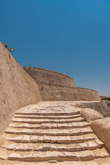Fototapeta na wymiar The stairs for the Ark fortress in Khiva, Uzbekistan