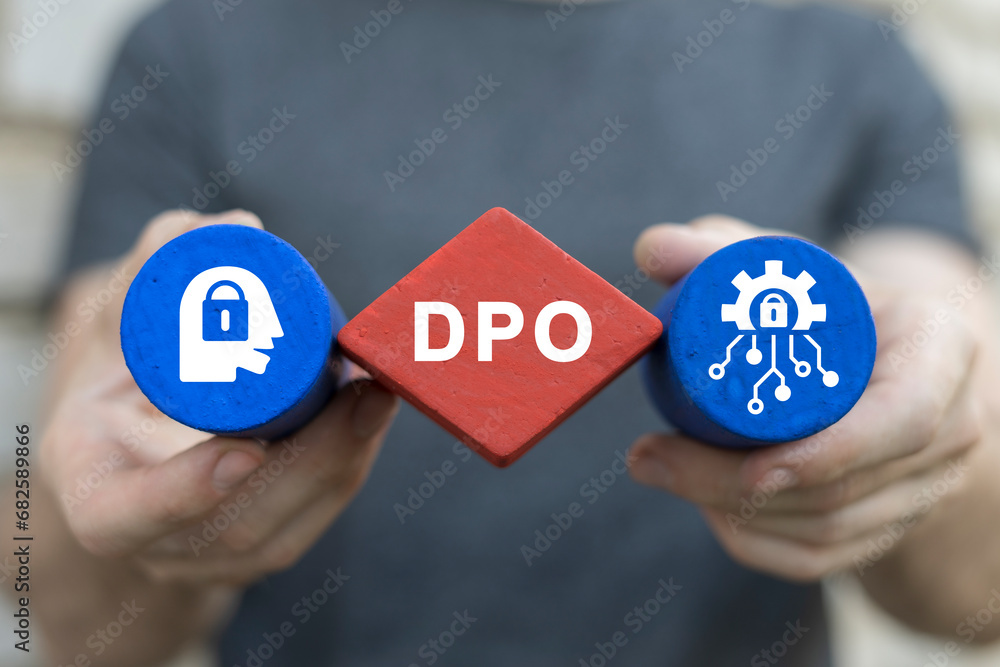 Poster man holding colorful blocks with icons sees abbreviation: dpo. computer, science, technology, busine