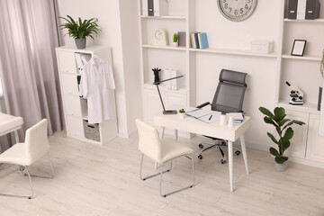Modern medical office interior with doctor's workplace