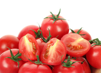 Whole and cut cherry tomatoes isolated on white, closeup