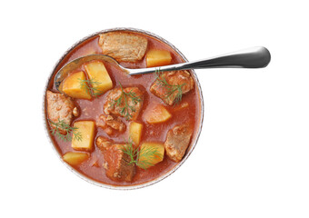 Delicious goulash in bowl isolated on white, top view