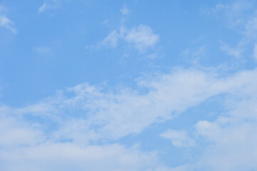 Fototapeta premium beautiful blue sky and white fluffy cloud with sunrise in the morning, natural background