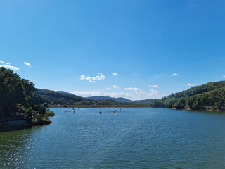 It is a landscape with a wide lake.