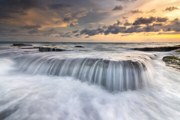 flowing at the sunset