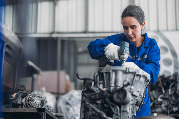 Car technician check engines, choose quality gear for precise repairs to ensure optimal performance