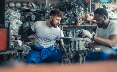 Car technician check engines, choose quality gear for precise repairs to ensure optimal performance