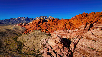 Fototapeta na wymiar The famous red rocks and beige sandstones at red Rock Canyon - aerial photography