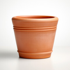 A simple empty elegant terracotta flower pot, isolated in white background