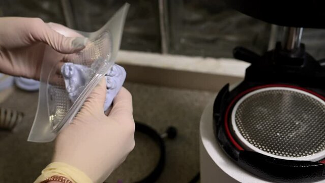 Mouth guard for teeth, printed on a 3D printer in dental clinic laboratory. 4k cinematic slow motion video