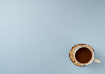 Coffee mug on blue background