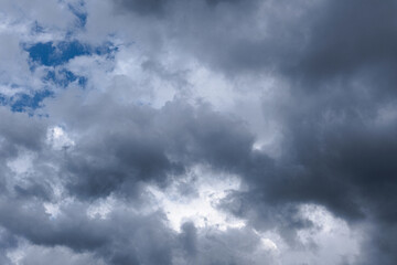 Fototapeta premium Gray dramatic clouds in blue sky. before the rain.
